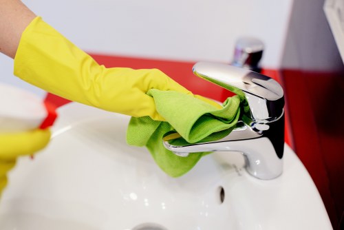 Carpet cleaning technician beginning a service with equipment ready